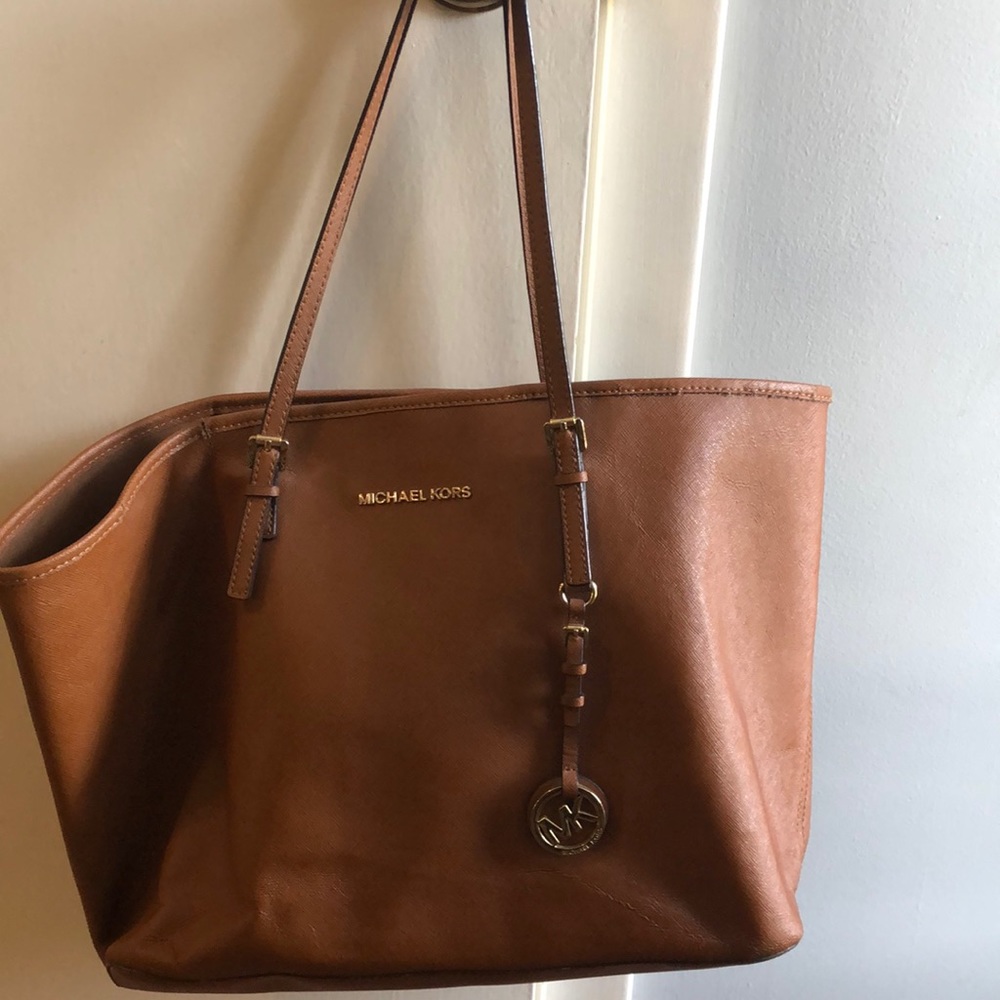 Michael kors tote. Some wear and tear.